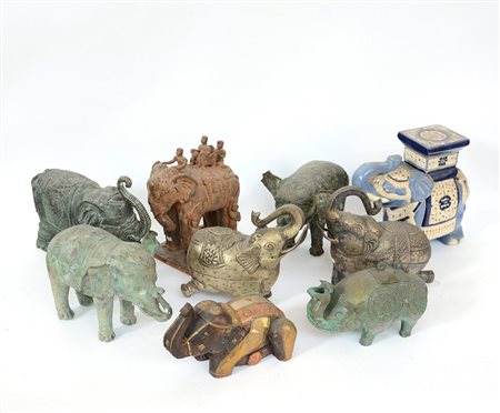 Manifattura orientale. Lotto composto da nove sculture raffiguranti elefanti...