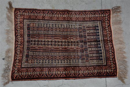 [Tappeti] Tappeto Afghan, sec. XX. Disegno geometrico nei toni del bianco,...