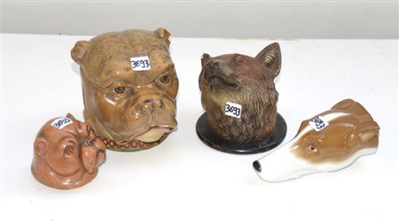 Lotto composto da quattro teste di animali in ceramica decorata in policromia...