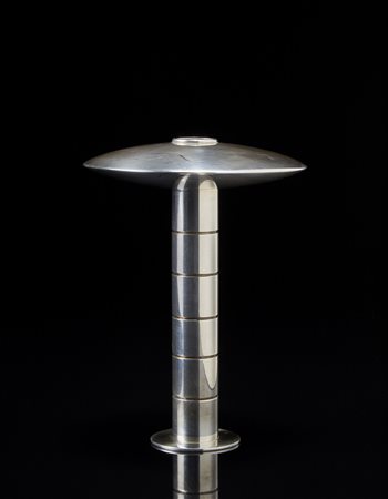 Lino Sabattini (1925 - 2016) Candeliere in metallo argentato (h. cm 16)....