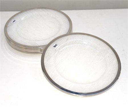 Gruppo di sei sottopiatti in plexiglass con ghiere in metallo cromato (d. cm...
