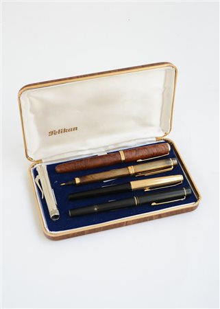 Lotto composto da cinque fra penne e portamatite placcate in oro e metallo...