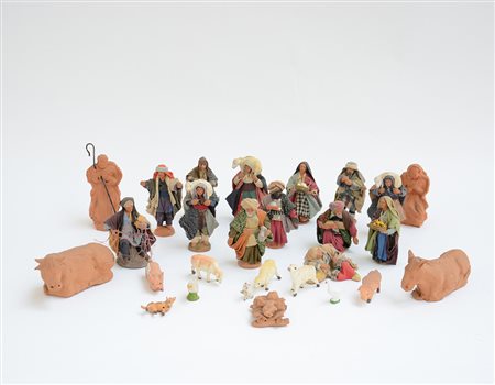 Lotto composto da ventidue statuine da presepe in terracotta (difetti)