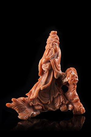 Ramo in corallo scolpito con saggio dalla lunga barba (difetti) Cina, sec. XX...