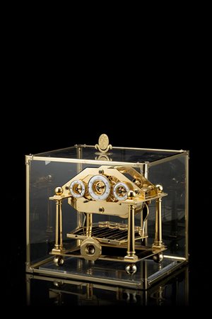 ANONIMOOrologio da tavolo "Congreve" in ottone dorato zapponatoEpoca...