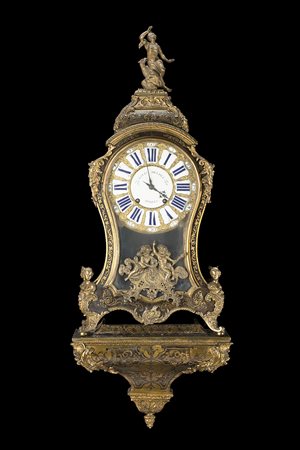 LUISE DELISLE A PARISOrologio cartel con mensola in legno, tartaruga e ottone...