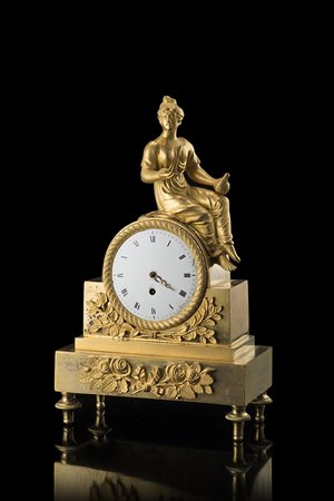 BERTONNIEPendola in bronzo dorato sormontata da figura femminileAnni...