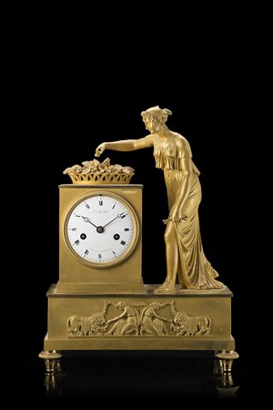 L. MALETTEPendola in bronzo dorato con figura femminile e cesto di fioriAnni...