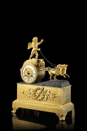 ANONIMOPendola in bronzo dorato e brunito con biga trainata da caniAnni...