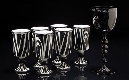 Lotto composto da sei calici in ceramica decorati a motivo zebrato e uno in...