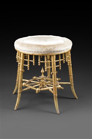 Sgabello in legno intagliato e dorato a finto bambù, gambe unite da elemento...