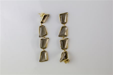 Orecchini in oro, gr 11.5. Diamanti cts 0.18 e quarzi fumè. Firmato...