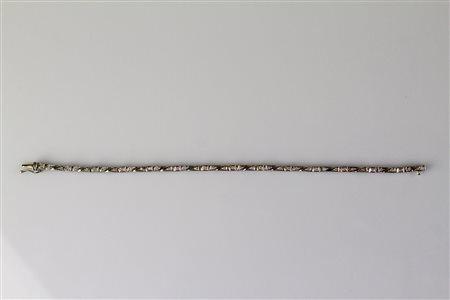 Bracciale in oro bianco 18kt, gr 11. Diamanti cts 0.34. . . [Nessun Autore]...