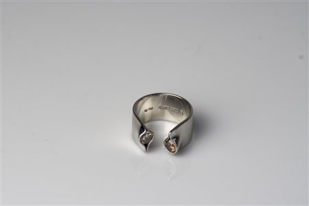Anello in platino e diamanti kojac e champagne, diamanti cts 0.55. Firmato...