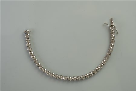 Bracciale tennis in oro bianco con 34 diamanti taglio brillante tondo....