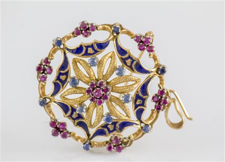 Spilla in oro 18kt con smalti, zaffiri e rubini, gr 15.10. . . [Nessun...