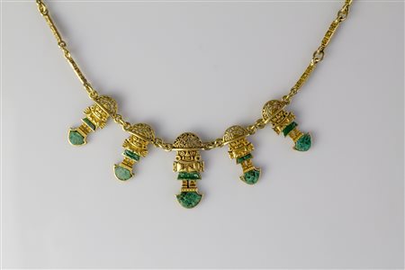 Collana in oro giallo 18kt rappresentante figure precolombiane con inserti...