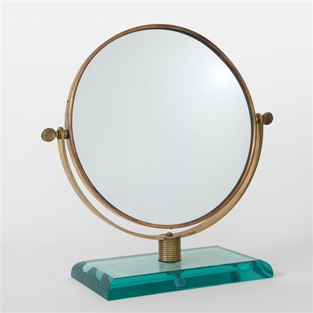 GIO PONTI Uno specchio da tavolo, anni '50. Ottone, cristallo molato,...