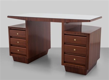 GIO PONTI Una scrivania, fine anni '40. Legno impiallacciato in palissandro,...