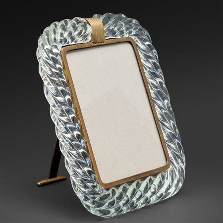 BAROVIER & TOSO Un portaritratti, anni '40. Cristallo ritorto, ottone....