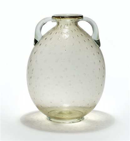 NAPOLEONE MARTINUZZI, VENINIUn vaso in vetro paglierino con bolle disposte...