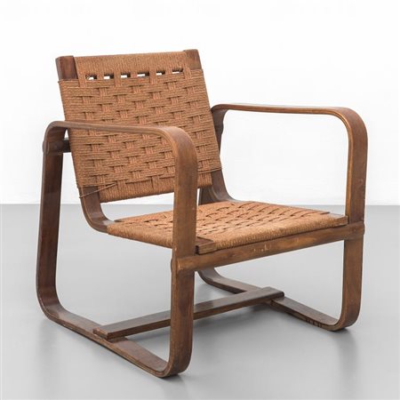 GIUSEPPE PAGANO POGATSHNIGUna poltrona per l'univesrsità Bocconi, 1942. Legno...