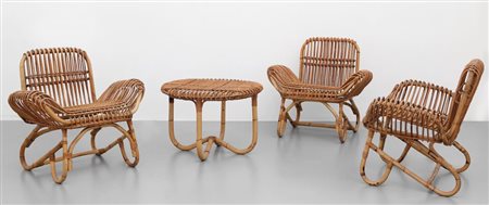 TRE POLTRONCINE E UN TAVOLINO, anni '60Malacca, bambù e canna d'India....