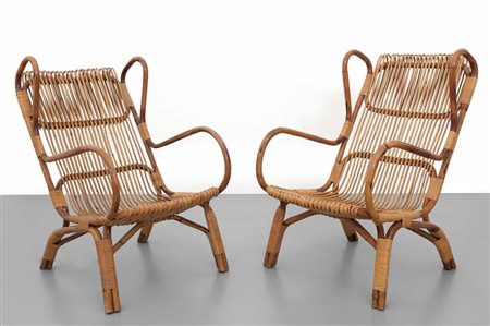 DUE POLTRONE, anni "60. Malacca. Bambù e canna d"India. Altezza cm 98,...