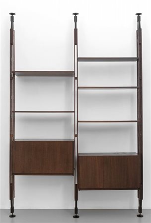 UNA LIBRERIA, anni '60. Legno di palissaandro, legno impiallacciato in...