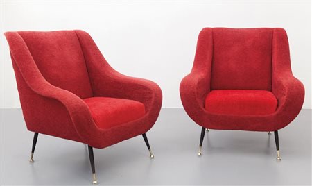 DUE POLTRONE, anni "60. Struttura in legno, gambe in ferro verniciato con...