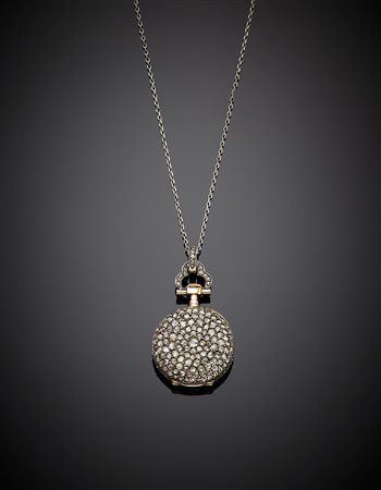 Orologio in oro giallo e argento con pavè di diamanti irregolari e catenina...