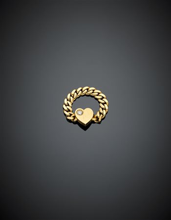 POMELLATOAnello a maglia groumette morbida in oro giallo con al centro un...