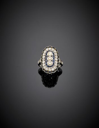 Anello in oro bianco con diamanti incolori e fancy yellow rifinito con...