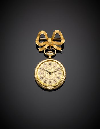 TICIN Spilla a fiocco in oro giallo a sostenere orologio tutto in metallo...