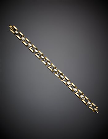 Bracciale modulare in oro giallo e bianco, g 11,68, lungh. cm 18,50...