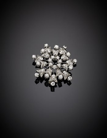 Spilla in platino e oro bianco a guisa di fiocco di neve con diamanti taglio...