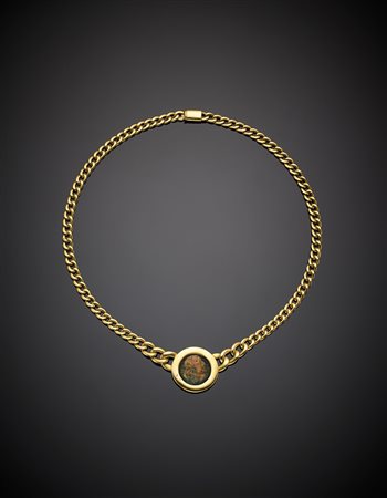 ADRIANO CHIMENTOCatena in oro giallo con moneta in rame a guisa di centrale,...