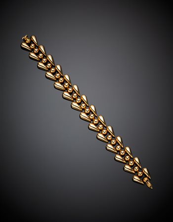 Bracciale in oro rosso modulare, g 37,83, lungh. cm 18,50 circa. (lievi...