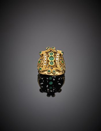 Anello oro giallo traforato con diamanti e smeraldi, g 10,04 misura 16/56....