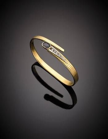 Bracciale elastico oro giallo diamanti e zaffiro a guisa di serpente...