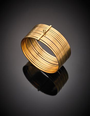Bracciale in oro giallo a dodici cerchi trattenuti da distanziatore, g 98,93,...