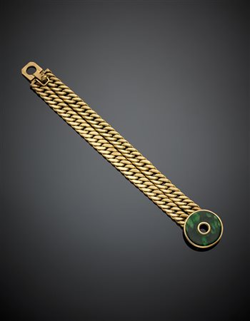 Bracciale in oro giallo a doppia maglia groumette con chiusura in quarzo...