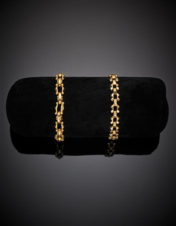 Due bracciali modulari in oro rosso, complessivi g 23,47. Lungh. cm 18 e cm...