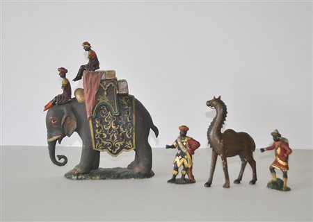 - Krippenfiguren (Elefant, 4 Figuren, Dromedar), Tirol um 1800;Holz gefasst,...