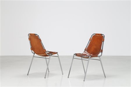 PERRIAND CHARLOTTE Due sedie in tubolare cromato, seduta e schienale in...