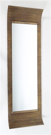 SOTTSASS ETTORE (1917 - 2007) Specchio da muro con cornice in ottone...