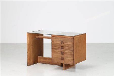 PONTI GIO' (1891 - 1979) Scrivania in rovere con piano in cristallo,...