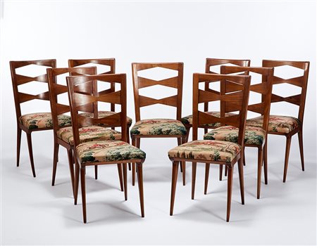 Gio Ponti (Milano 1891 - Milano 1979) Nove sedie in noce con gambe...