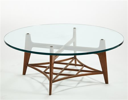 Tavolo basso con struttura in mogano massello a quattro gambe sagomate,...