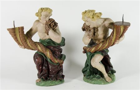 Paio di torcere in legno policromo scolpito raffiguranti personaggi, Austria,...